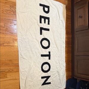 Peloton Cream Beach Towel with Black Logo